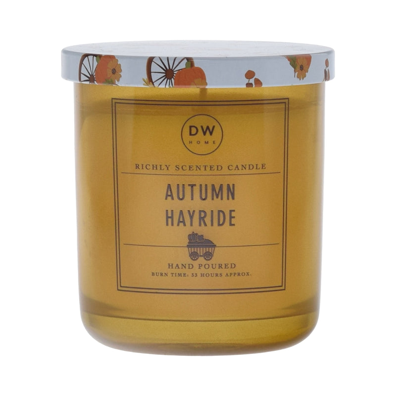 DW Home Autumn Hayride candle with decorative lid on a white background