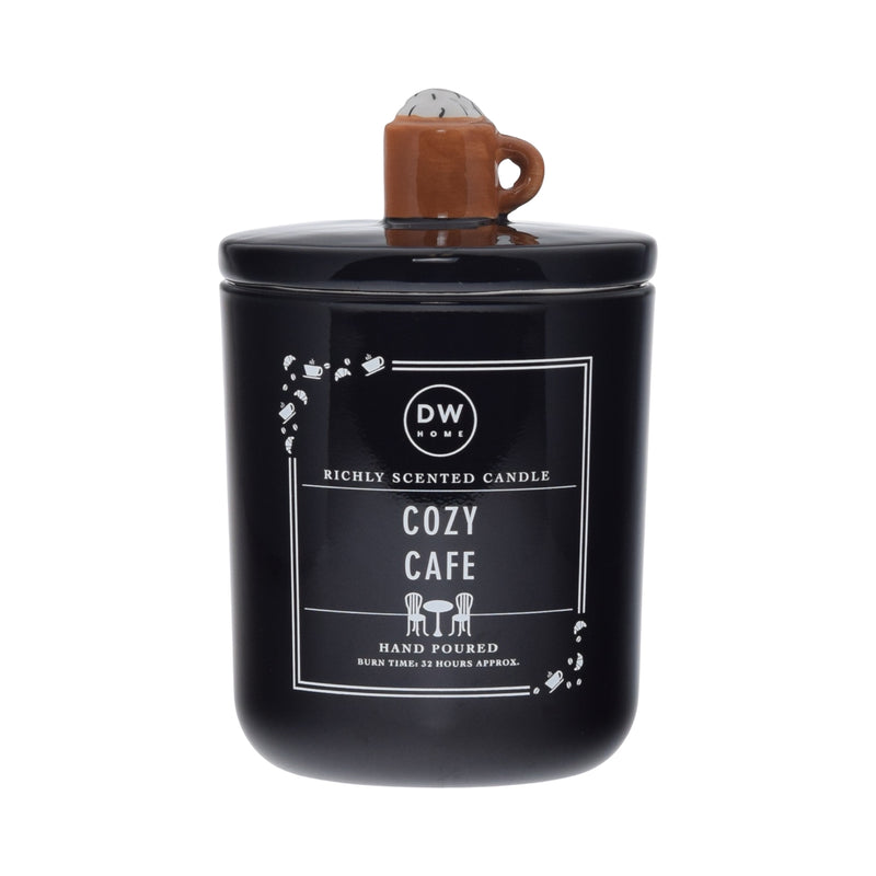 Black candle labeled 'Cozy Cafe' with a brown mug on top of the lid
