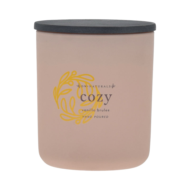 Cream candle with a black lid and gold logo on a cream background