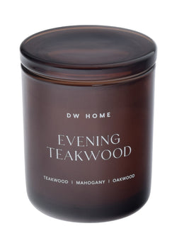 Brown DW Home candle labeled 'Evening Teakwood'