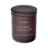 Brown DW Home candle labeled 'Evening Teakwood'