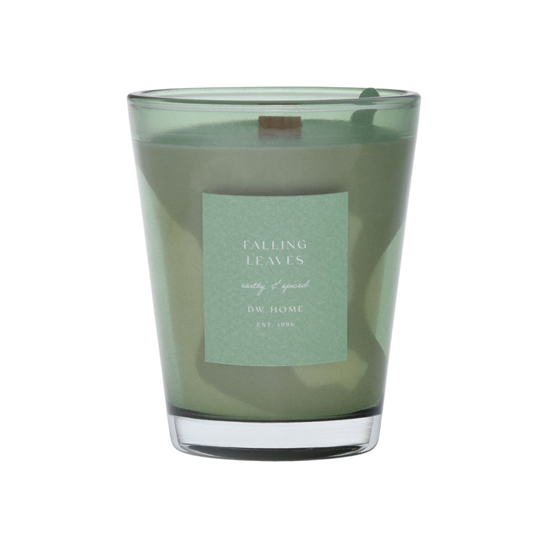 Green vase candle with a label on a green background
