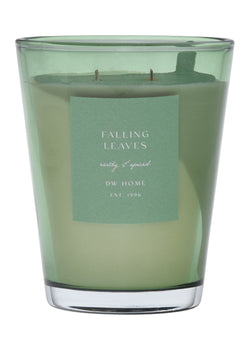Green vase candle with a label on a green background
