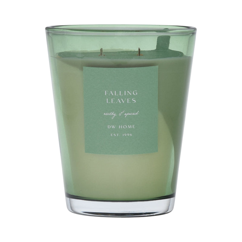 Green vase candle with a label on a green background
