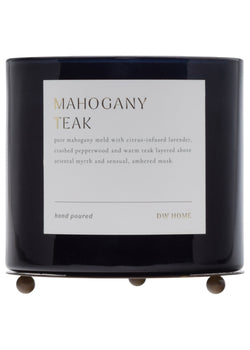 Black candle with a label on a white background