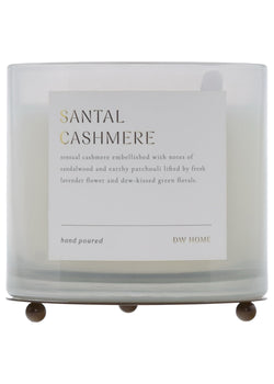 Santal Cashmere candle with a label on a white background