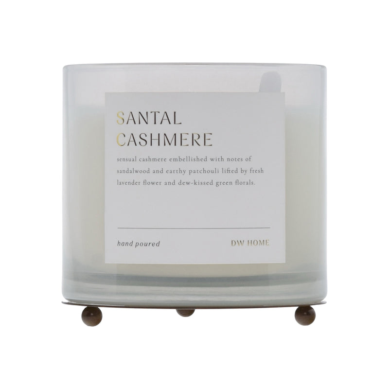 Santal Cashmere candle with a label on a white background