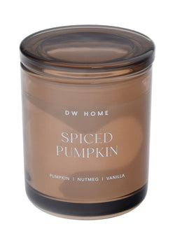 Brown DW Home candle labeled 'Spiced Pumpkin'