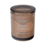 Brown DW Home candle labeled 'Spiced Pumpkin'