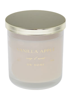 Vanilla Apple DW Home candle with gold lid on a white background