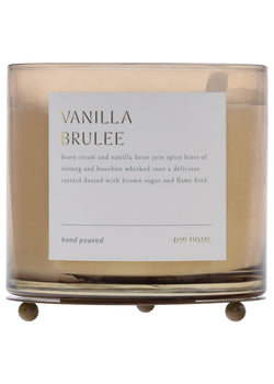 Candle with 'Vanilla Brulee' label on a white background