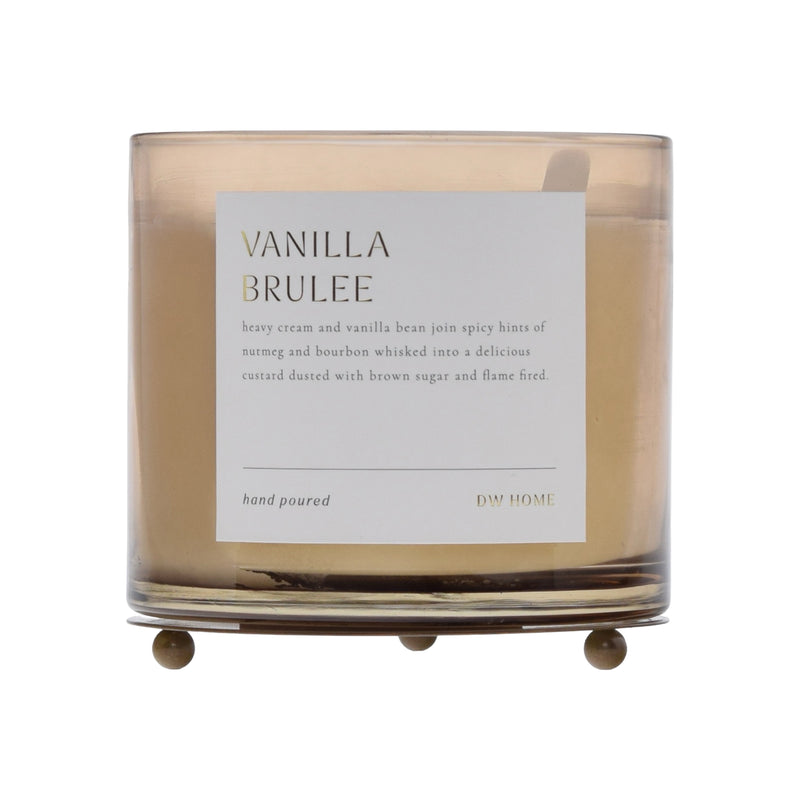 Candle with 'Vanilla Brulee' label on a white background