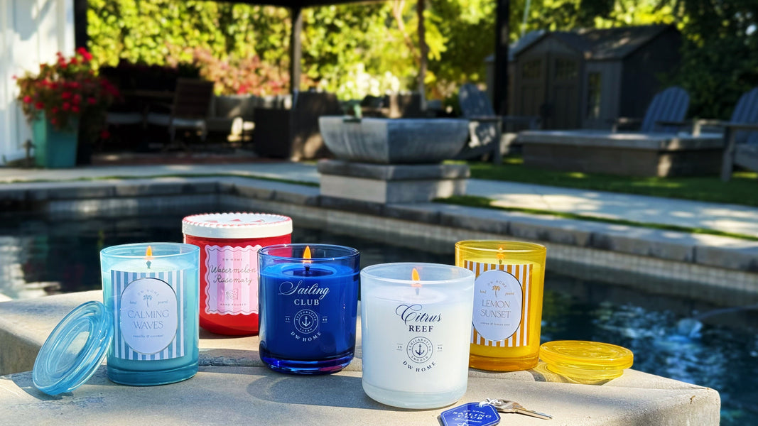 Summer 2026 candles on ledge poolside