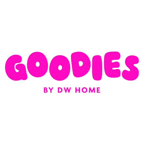 Bright pink "goodies" text on a white background, with "by dw home" in smaller lettering below.