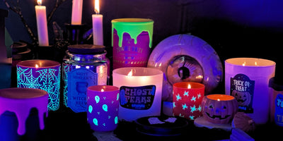 halloween candles with big jack-o-lantern and ghost knobs.