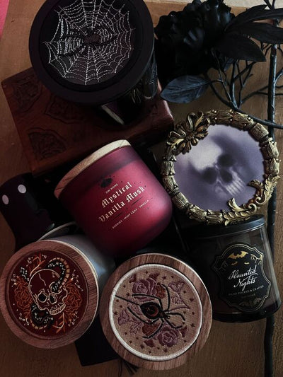 Mystical Vanilla Musk Candle alongside other candles 
