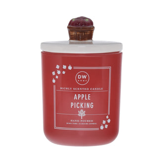 Red candle labeled 'Apple Picking' with a decorative lid with an apple basket