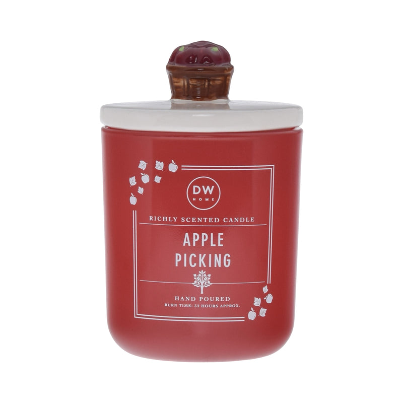 Red candle labeled 'Apple Picking' with a decorative lid with an apple basket