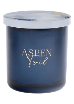 Dark blue Aspen Trail candle with metallic gold print.
