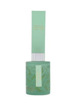 green balsam fir reed diffuser with green reed pack.