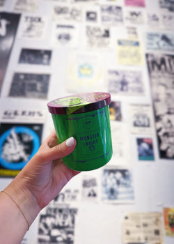 Hand holding Monster Fright Candle Single Wick