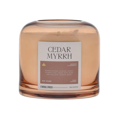 Candle labeled 'Cedar Myrrh' with a label on a white background