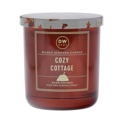 Red DW Home candle labeled 'Cozy Cottage' on a white background