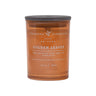 Golden Leaves candle with 'Charming Farmhouse' label on a dark orange background