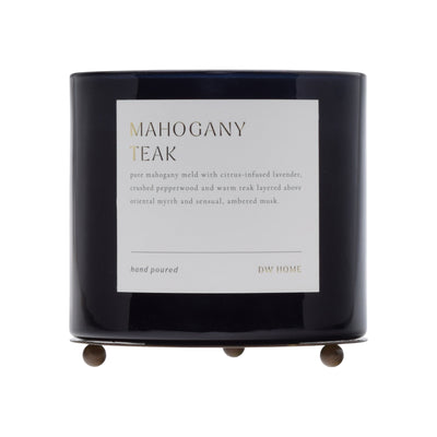 Black candle with a label on a white background