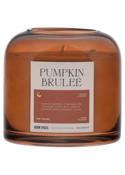 Brown glass candle with 'Pumpkin Brulee' label on a white background