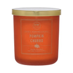 Orange candle with gold lid labeled 'Pumpkin Churro' on a white background