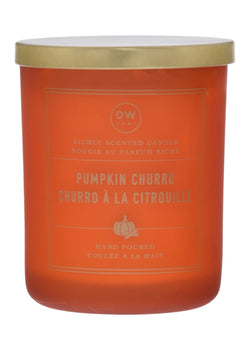 Orange candle with gold lid labeled 'Pumpkin Churro' on a white background