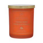 Orange candle with gold lid labeled 'Pumpkin Churro' on a white background