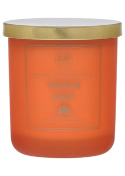 Orange candle with a gold lid labeled 'Pumpkin Donut' on a white background