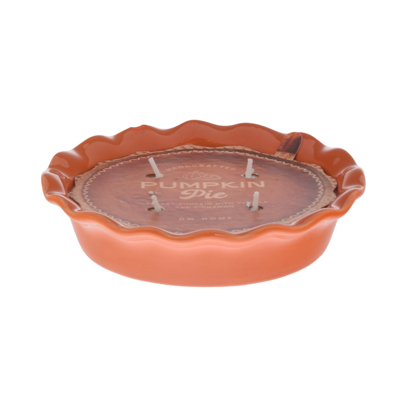 Pumpkin pie-shaped candle with 'Pumpkin Pie' text on a white background