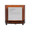 Pumpkin spice candle with a label on a white background