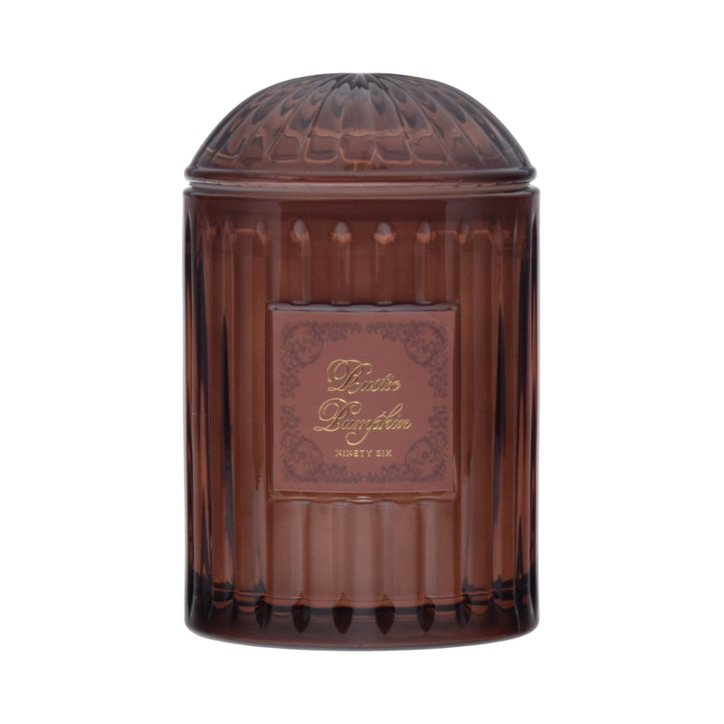 Brown decorative container with a textured surface and visible brand name on a brown background