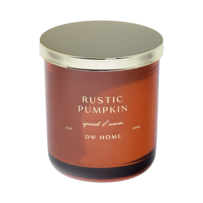 Dark orange Candle jar labeled 'Rustic Pumpkin' by DW Home