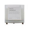 Santal Cashmere candle with a label on a white background