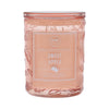 Decorative candle jar with 'Sweet Apple' label on a white background