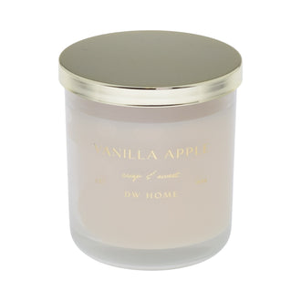 Vanilla Apple DW Home candle with gold lid on a white background