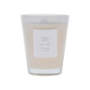 White vase, Vanilla Apple candle with a label on a white background