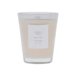 White vase, Vanilla Apple candle with a label on a white background