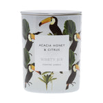 Acacia Honey and Citrus, large double wick candle. White candle with zebra and palm tree graphic.