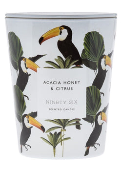 Black Acacia Honey and Citrus, XL double wick candle. White candle with zebra and palm tree graphic.