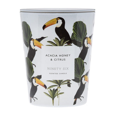 Black Acacia Honey and Citrus, XL double wick candle. White candle with zebra and palm tree graphic.